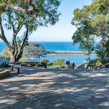 Beautiful Area with stone pavement at West Head Lookout Point and Barrenjoey Head background Blur - stock photo
Sydney NSW Australia - June 5th 2020 - Ku-ring-gai Chase National Park on a sunny winter afternoon