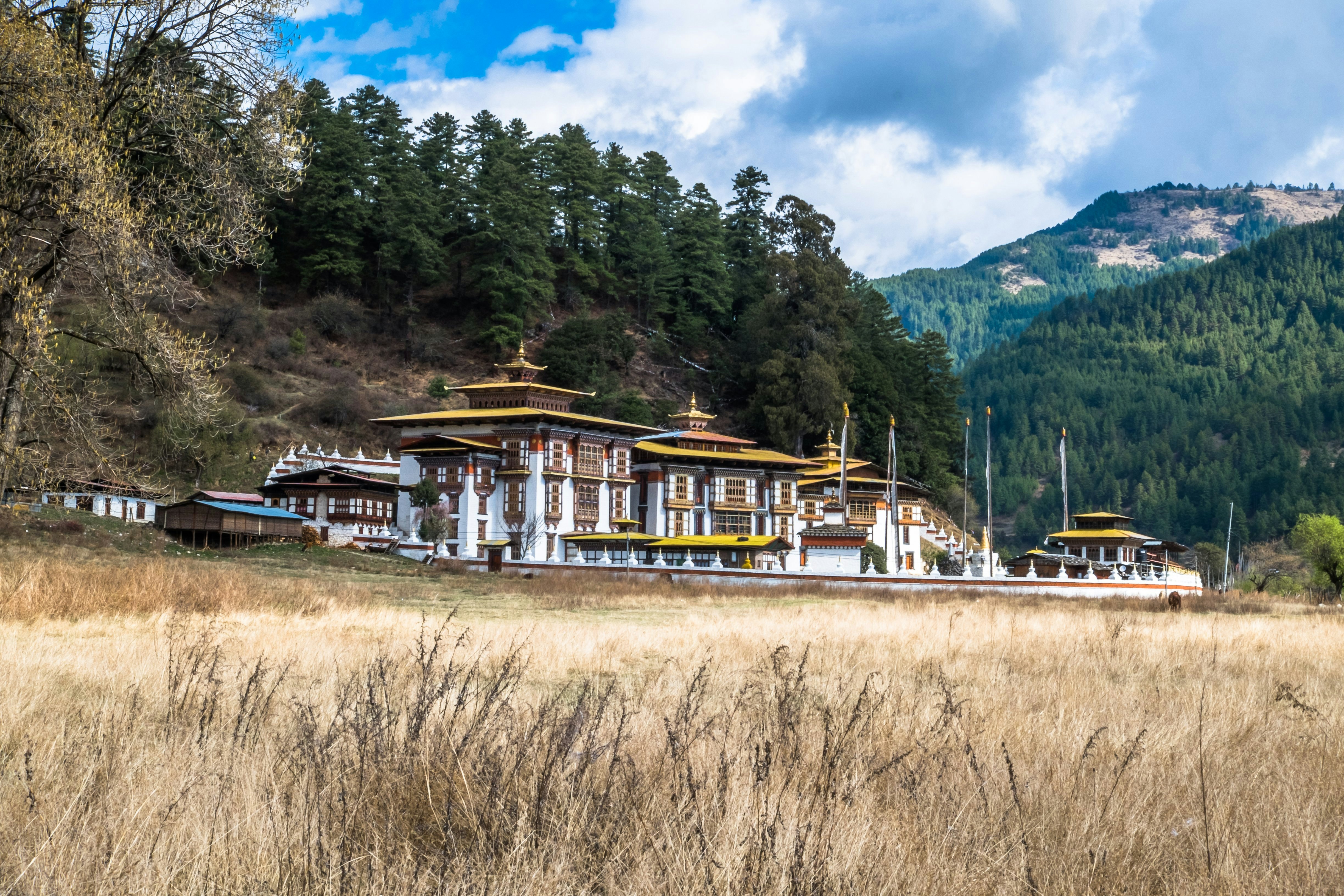 Kurjey Lhakhang means "Body Imprint Temple" is located in Bumthang, central Bhutan. It was built in the 8th century. Guru Rinpoche, the tantric master of Bhutan Buddhism, meditated in this temple for three months and left his body imprint inside the cave. "Kurjey" means body imprint. At the side of the temple there is a tall cypress tree that is believed to have sprouted from the walking stick of Guru Rinpoche.
