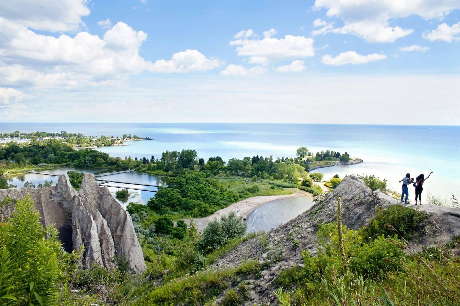 People looking over the shoreline from Scarborough Bluffs, Toronto 