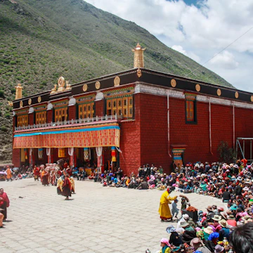 Tibet / China - Oct 2017: The Tibetan pilgrims on a celebrating the birthday of Buddha in red color famous Buddhist temple Tsurphu near Lhasa in Central Tibet. Sacred place for Buddha pupils.;
Tsurphu Monastery
Shutterstock ID 1097531960; your: Bridget Brown; gl: 65050; netsuite: Online Editorial; full: POI Image Update