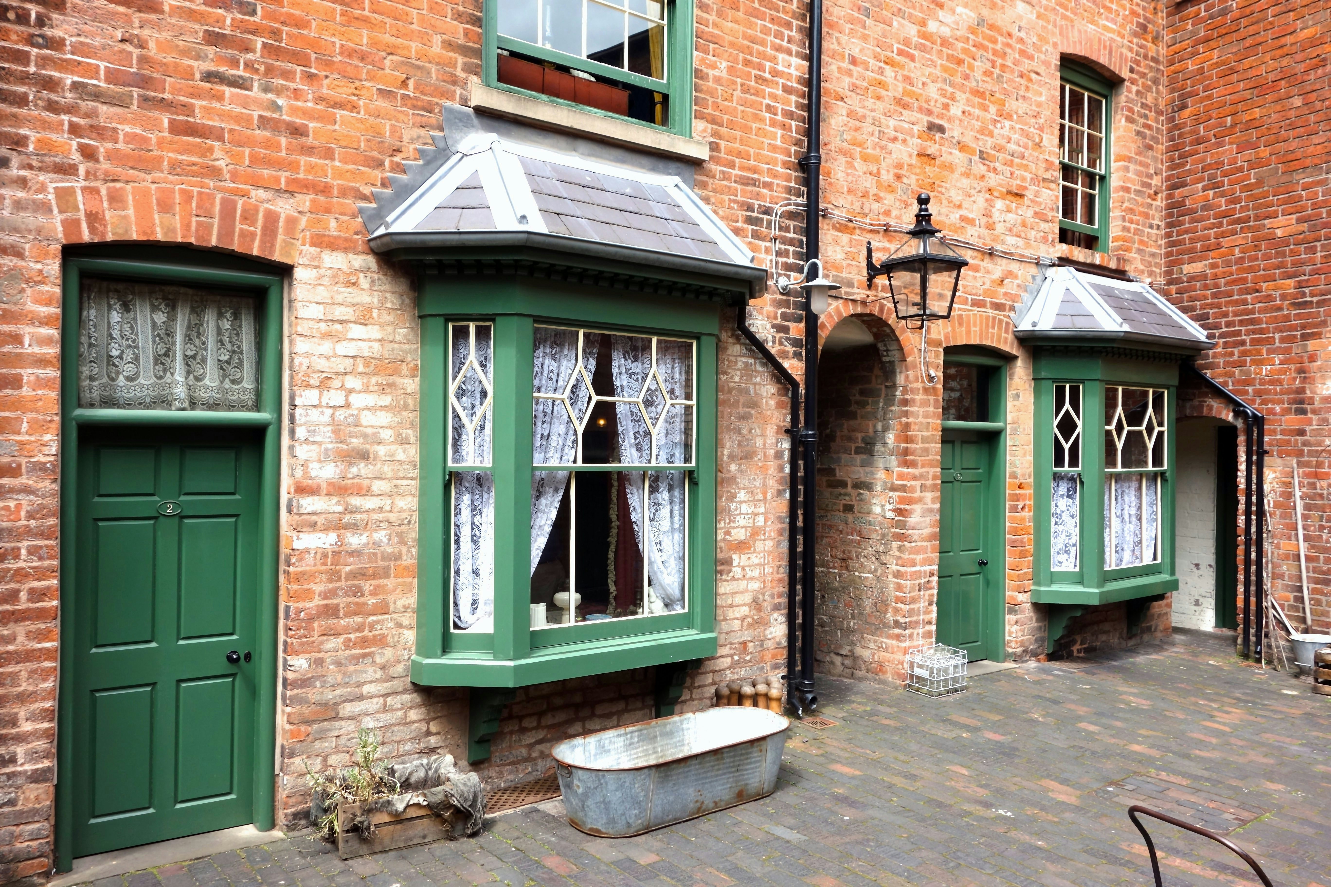 BIRMINGHAM, ENGLAND - JULY 4. The Birmingham Back-to-Backs are a block of Victorian dwellings which have been preserved and open to the public in the city centre. July 4 2016 in Birmingham, England.; Shutterstock ID 453993793; your: Bridget Brown; gl: 65050; netsuite: Online Editorial; full: POI Image Update