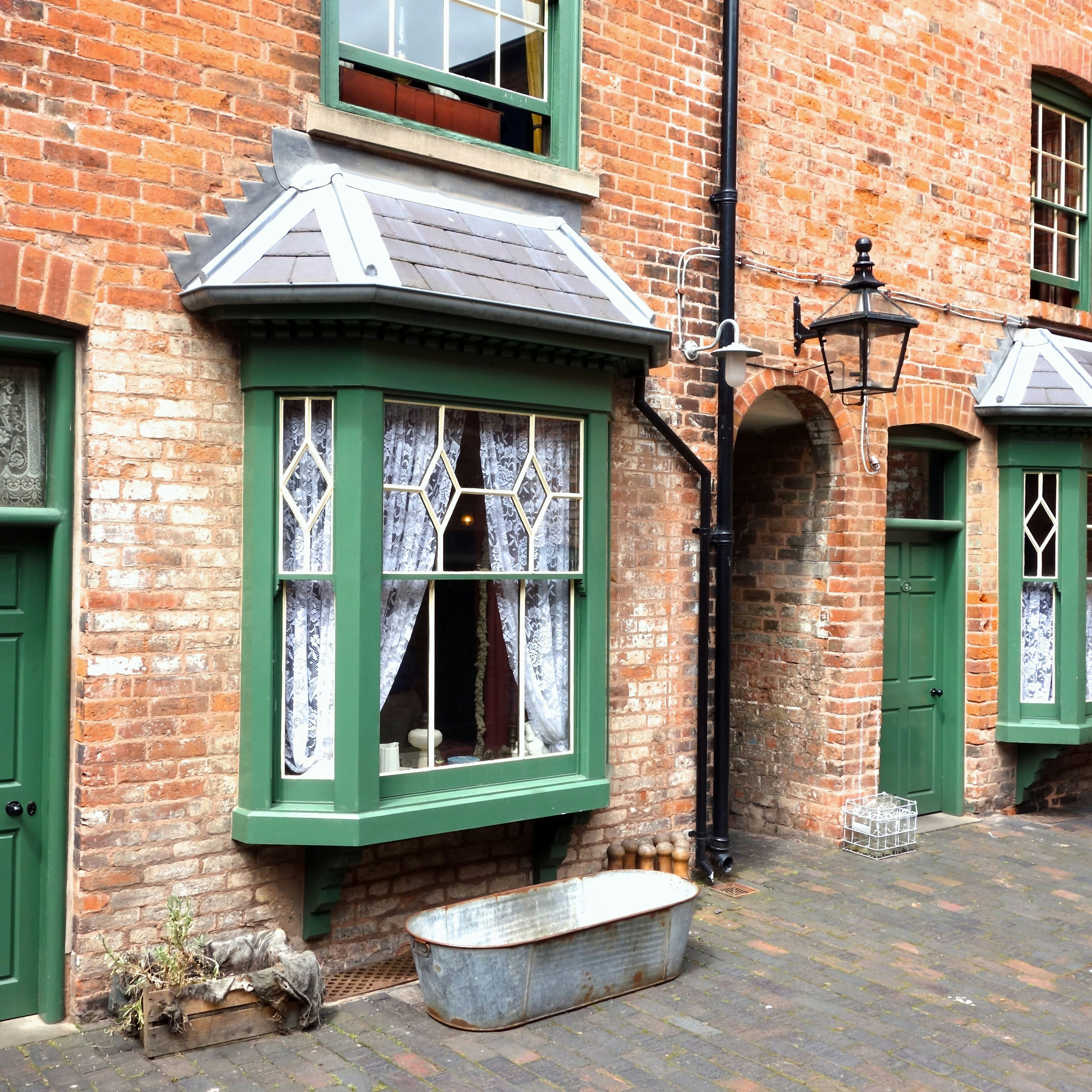BIRMINGHAM, ENGLAND - JULY 4. The Birmingham Back-to-Backs are a block of Victorian dwellings which have been preserved and open to the public in the city centre. July 4 2016 in Birmingham, England.; Shutterstock ID 453993793; your: Bridget Brown; gl: 65050; netsuite: Online Editorial; full: POI Image Update