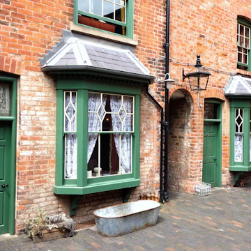 BIRMINGHAM, ENGLAND - JULY 4. The Birmingham Back-to-Backs are a block of Victorian dwellings which have been preserved and open to the public in the city centre. July 4 2016 in Birmingham, England.; Shutterstock ID 453993793; your: Bridget Brown; gl: 65050; netsuite: Online Editorial; full: POI Image Update