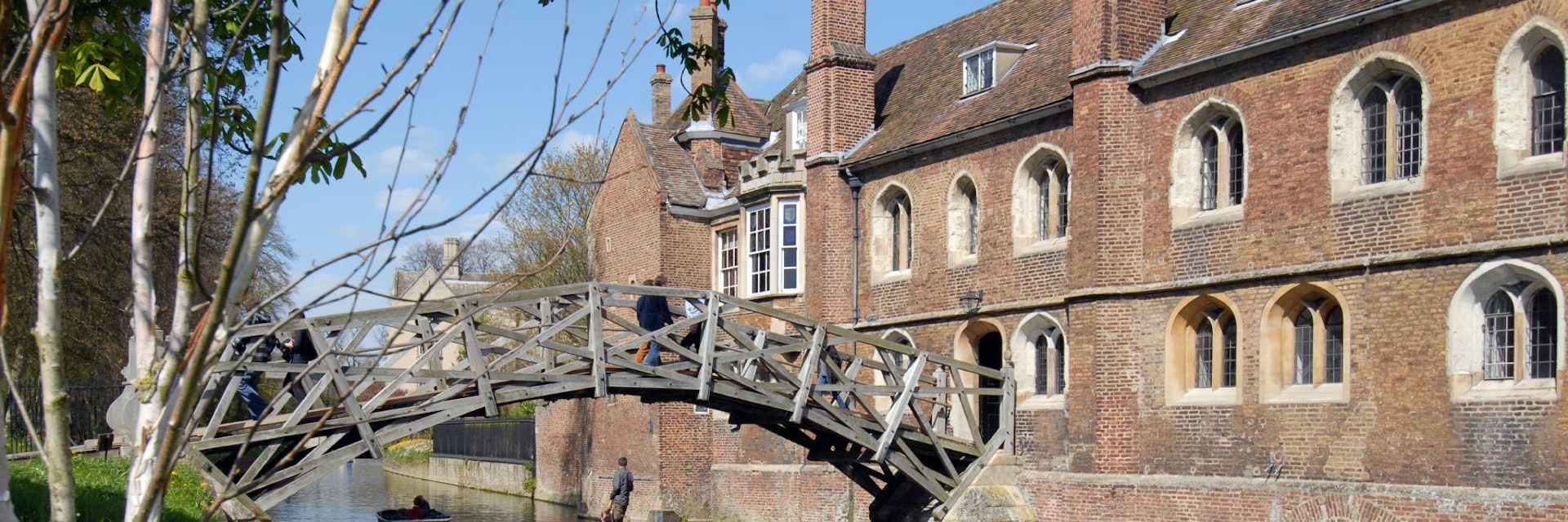 The Mathematical bridge at Queens college in Cambridge..Taken on a bright spring day.
Queens' College with bridge and flowers