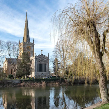 Holy Trinity Church on the banks of the river Avon in Stratford upon Avon, UK. The grave of playright William Shakespeare is in the church.