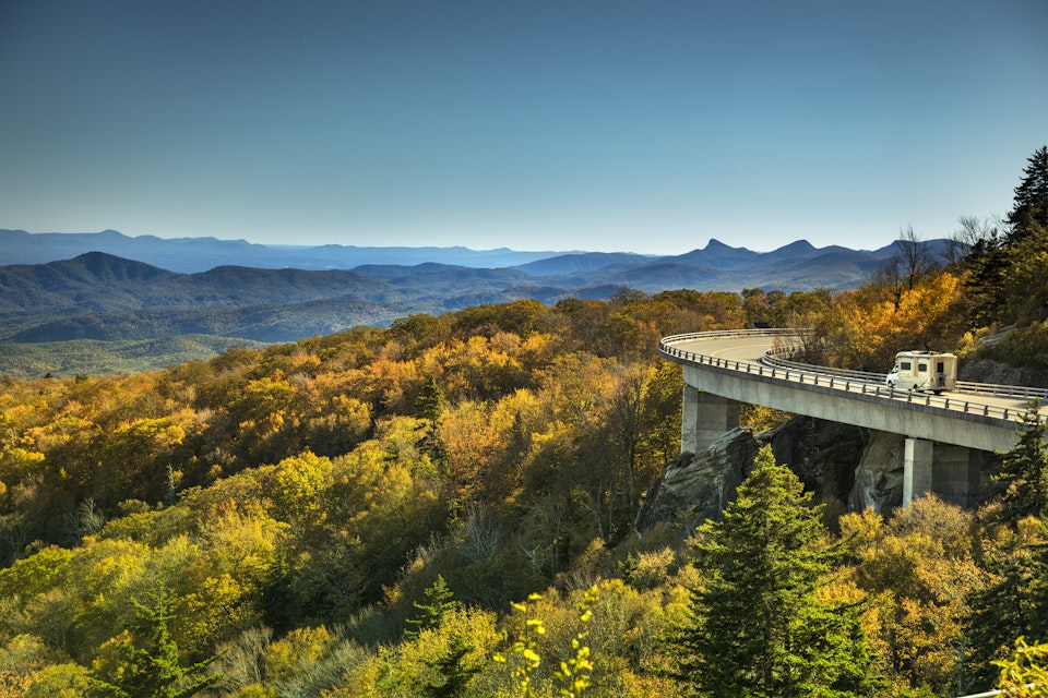 Linn Cove Viaduct Blue Ridge Parkway in autumn

Cars travel on the Linn Cove Viaduct highway road on the Grandfather Mountain along the Blue Ridge Parkway in autumn North Carolina USA