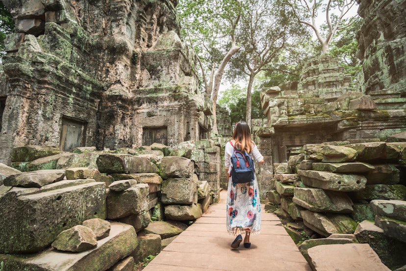 A woman exploring the ruins of Angkor, Cambodia