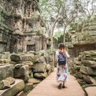 A woman exploring the ruins of Angkor, Cambodia