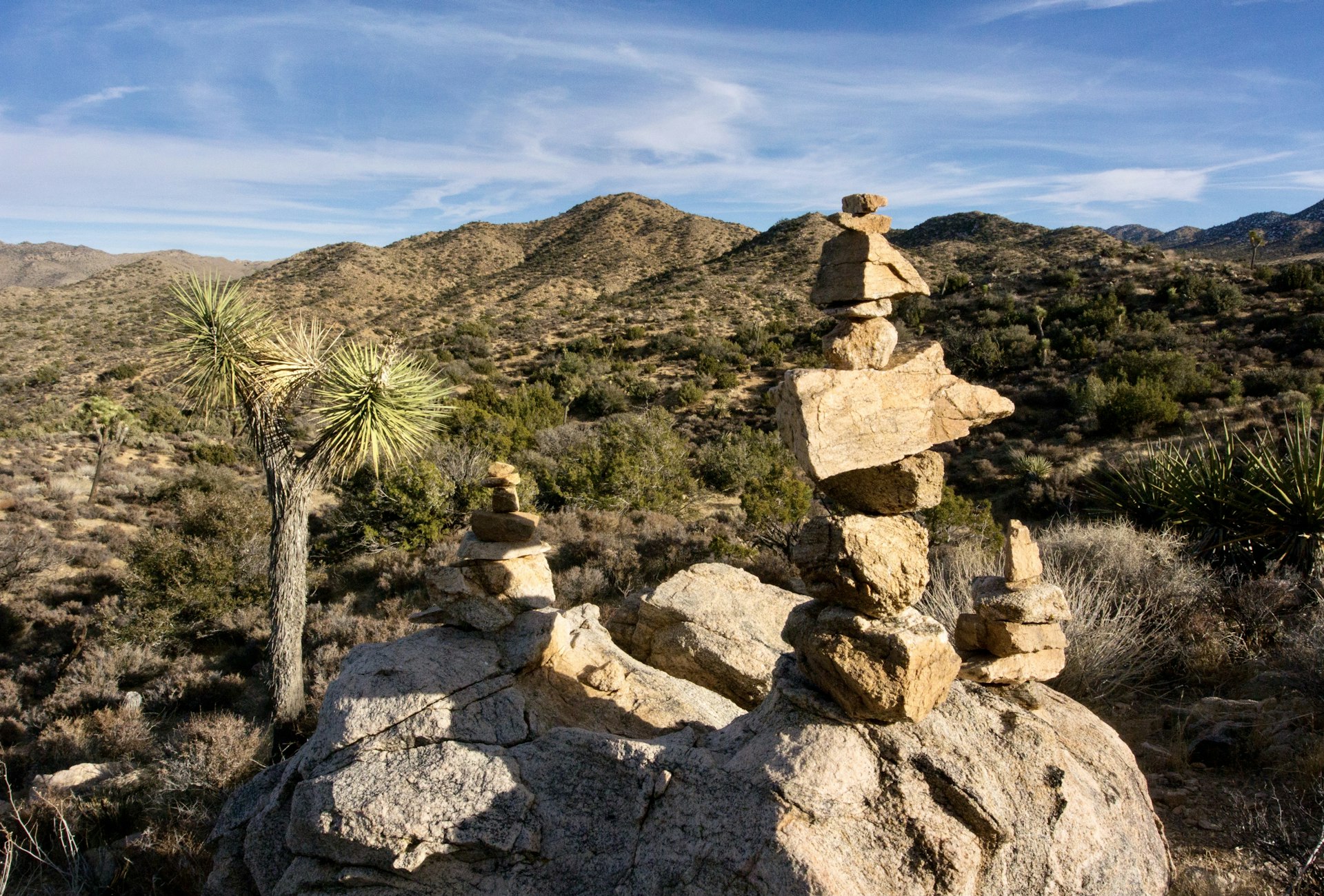 Close-up of rock cairns created by visitors in Joshua Tree National Park