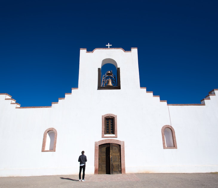 A man at the Socorro Mission on the Mission Trail near El Paso