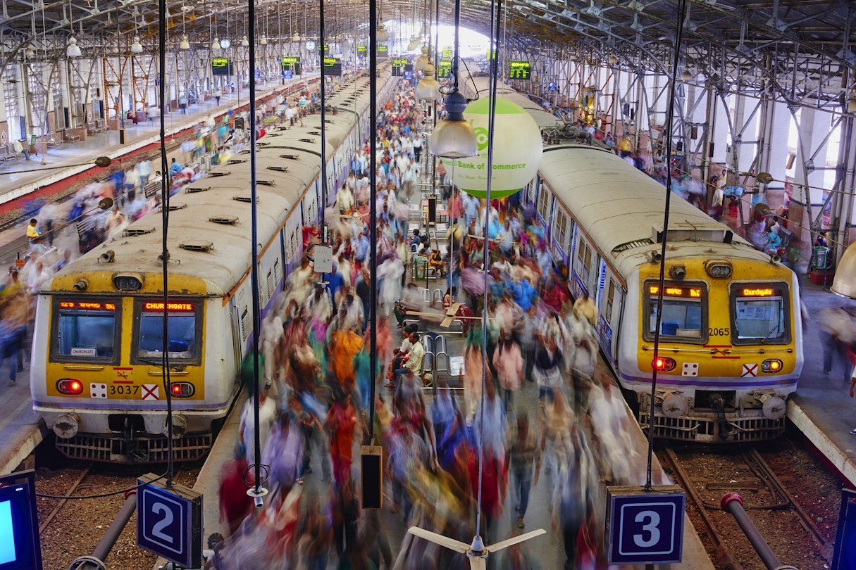 Passengers board trains at Mumbai's Chhatrapati Shivaji MaharajTerminus