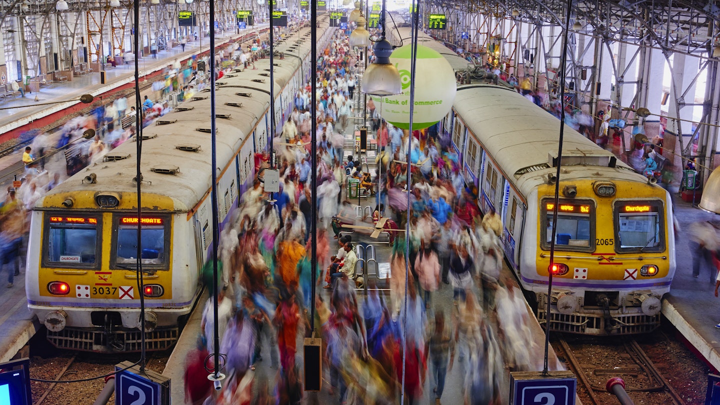 Passengers board trains at Mumbai's Chhatrapati Shivaji MaharajTerminus
