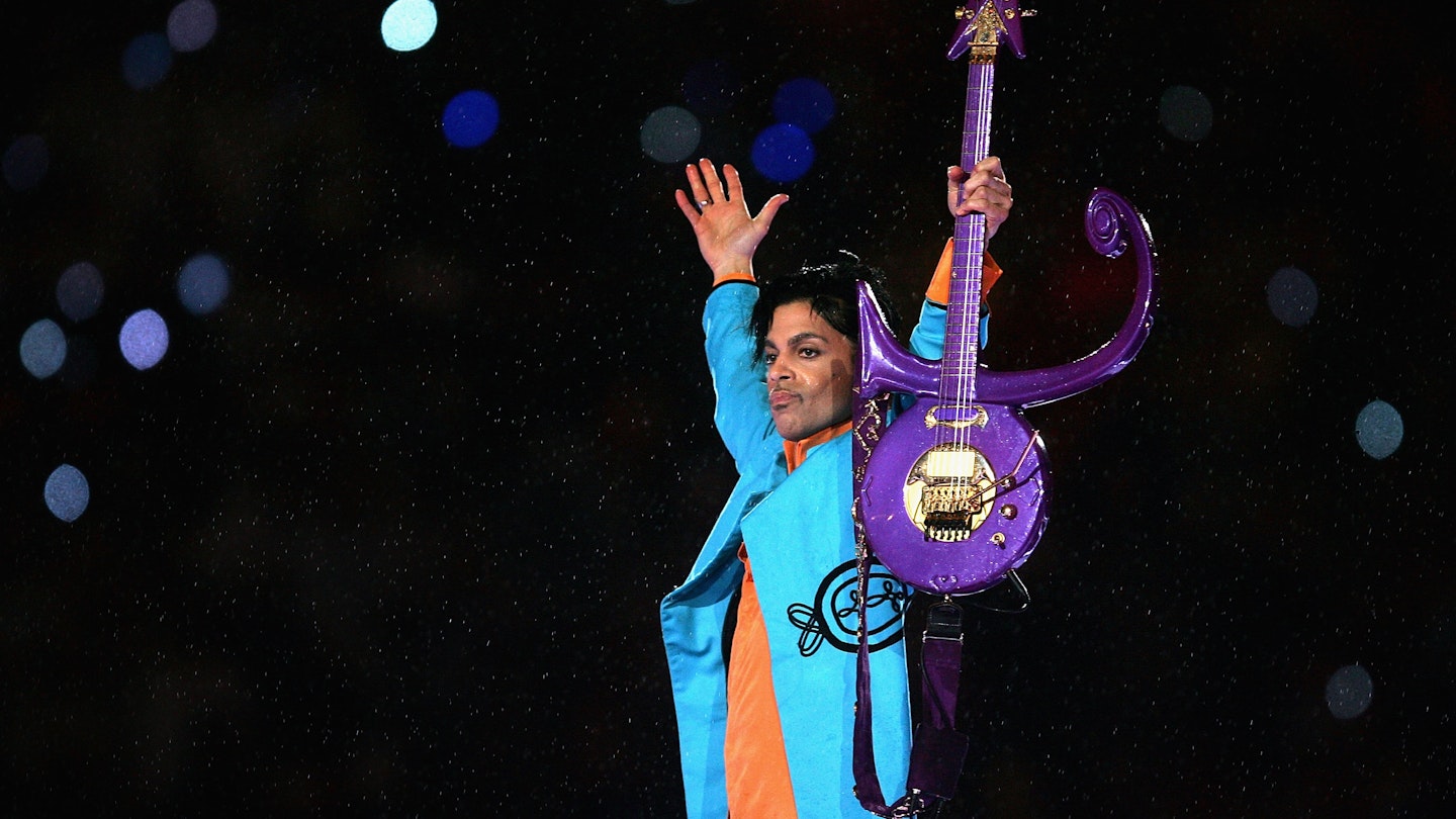MIAMI GARDENS, FL - FEBRUARY 04: Prince performs during the "Pepsi Halftime Show" at Super Bowl XLI between the Indianapolis Colts and the Chicago Bears on February 4, 2007 at Dolphin Stadium in Miami Gardens, Florida. (Photo by Jonathan Daniel/Getty Images)