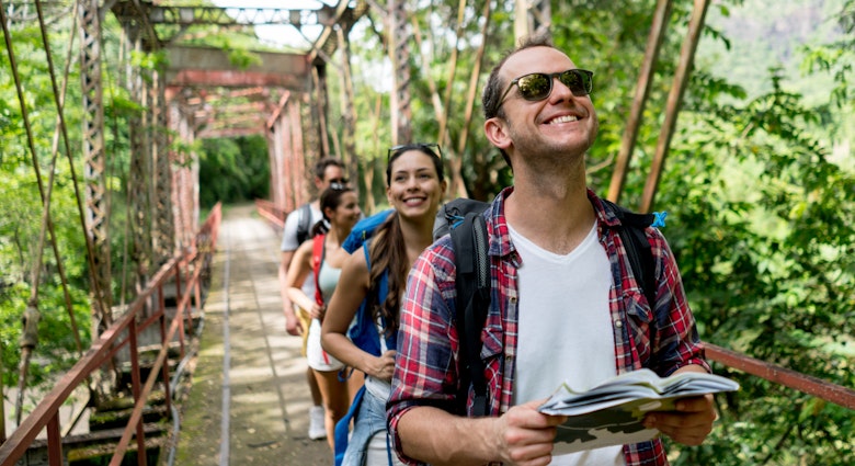 Group hiking through forest in Colombia