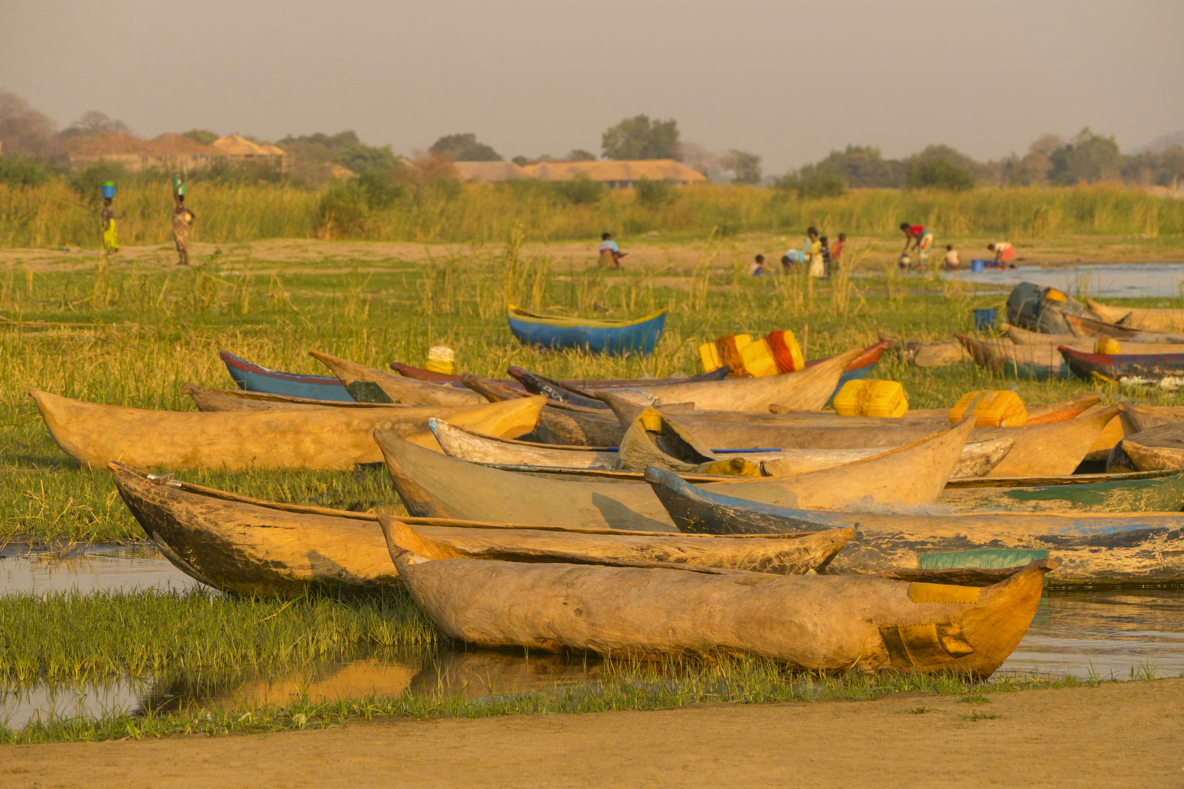 Traditional African Boats on Shore in Morning on Lake Malawi near Salima in Malawi.