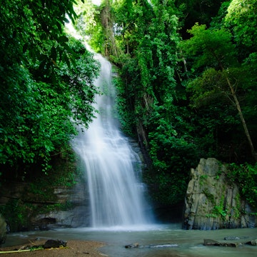 Shuknachara Waterfall, surrounded by dense green forest, is located in the Rangamati District of Chittagong.