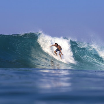 Surfing in West Sumbawa.