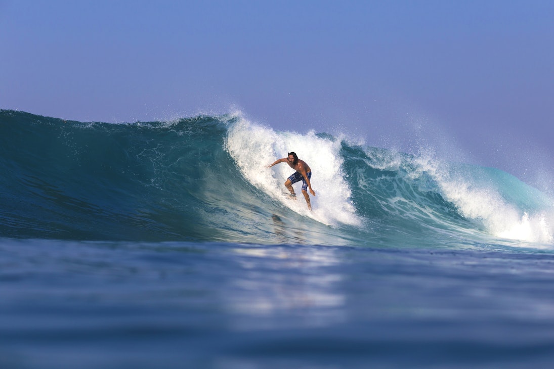 Surfing in West Sumbawa.