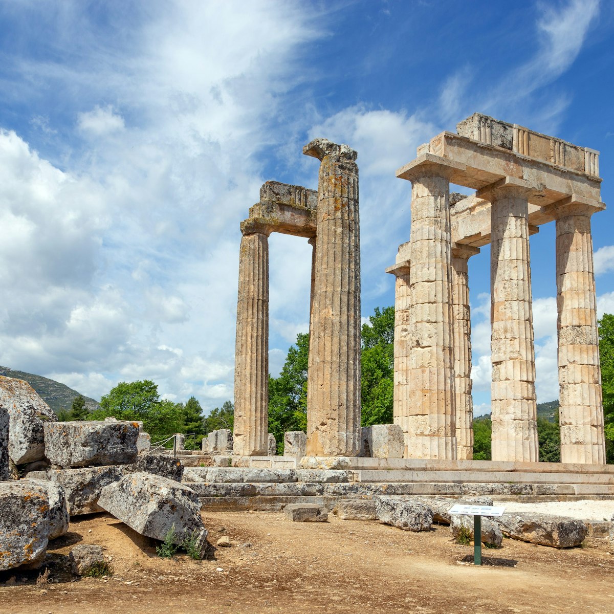 The Temple of Zeus built around 330 BC is a Doric peripteral temple consisting of 32 limestone outer columns (6 by 12 columns) and the construction is unusual as it included all three Greek architectural forms, the Doric, the Corinthian, and the Ionic.