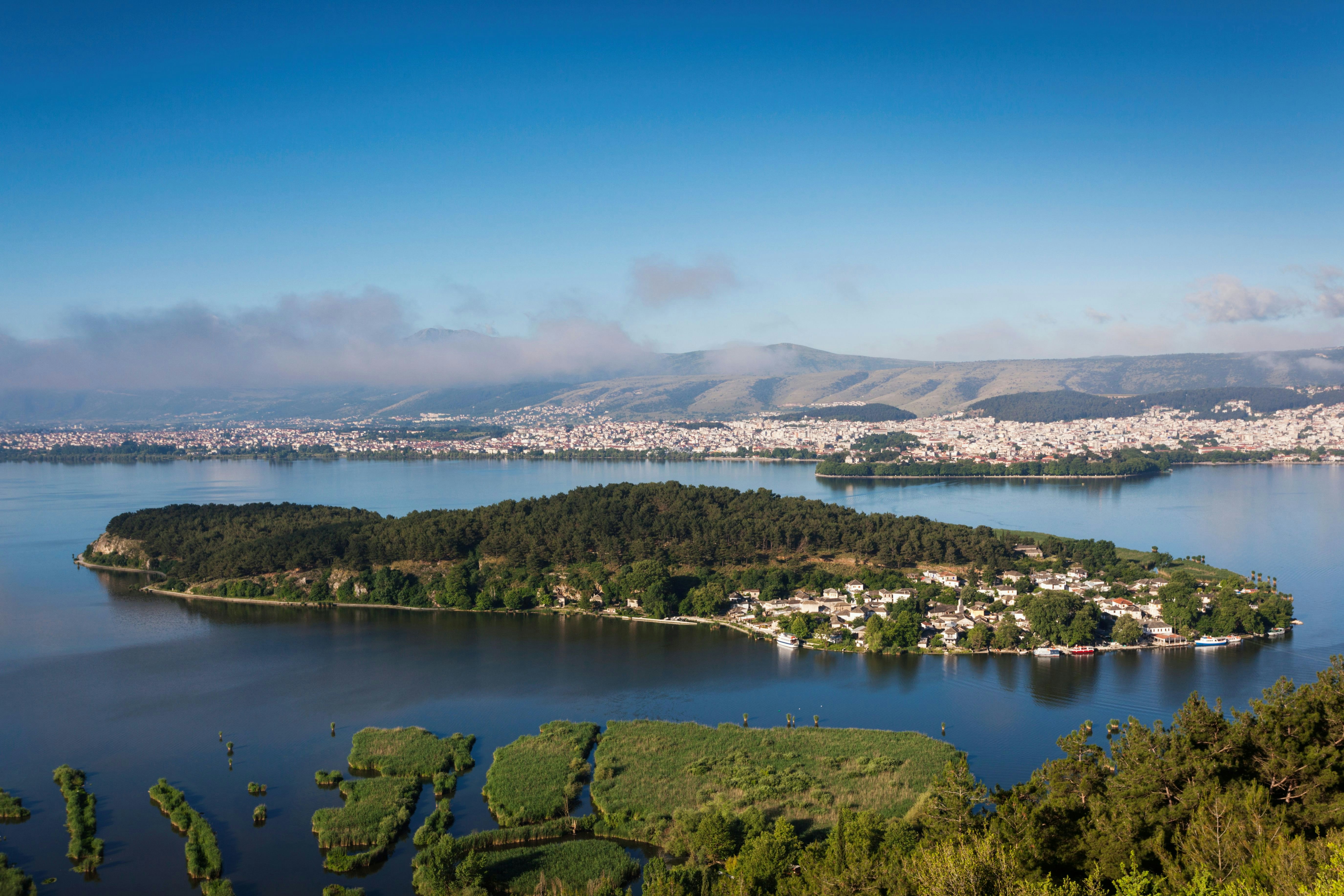 Greece, Epirus Region, Ioannina, elevated city view, Lake Pamvotis and Nisi Island.