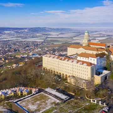 Pannonhalma, Hungary - Aerial view of the Benedictine Pannonhalma Archabbey on the top of Mount of Saint Martin. This is the second largest territorial abbey in the world.