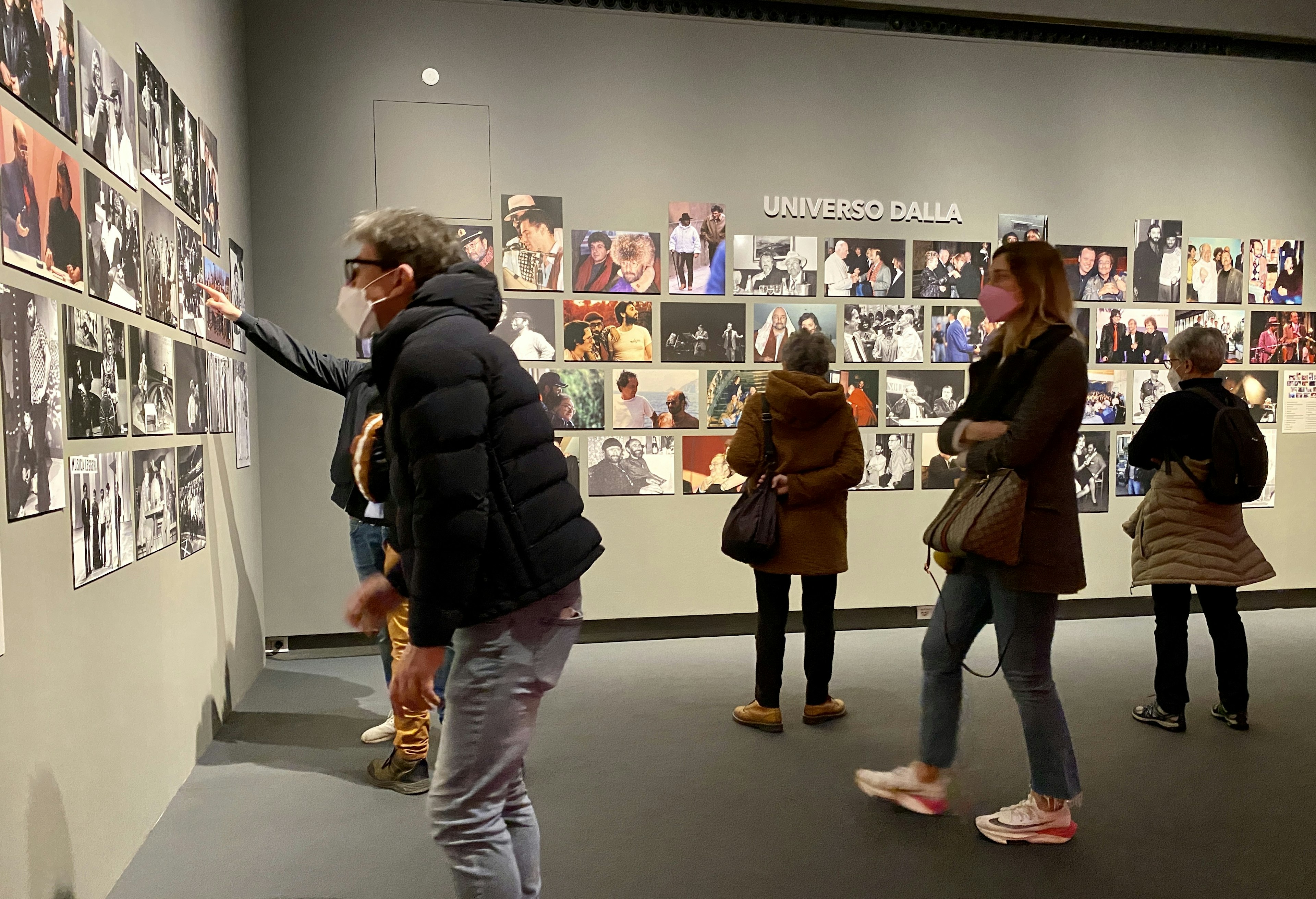 A wall of photos at the Lucia Dalla exhibit