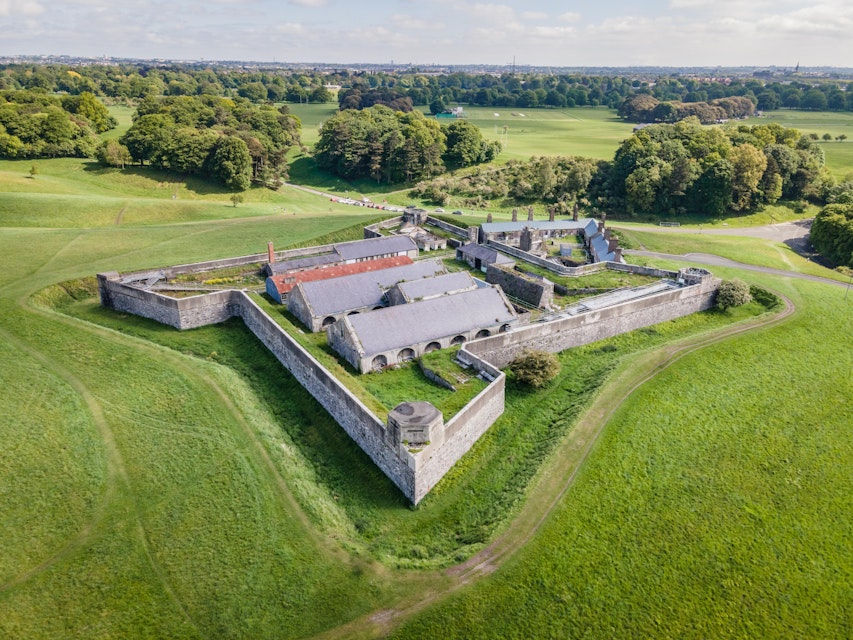 Drone aerial view over the old magazine fort in Phoenix Park, Dublin, on a bright sunny day with green grassy slopes all around
Magazine Fort
