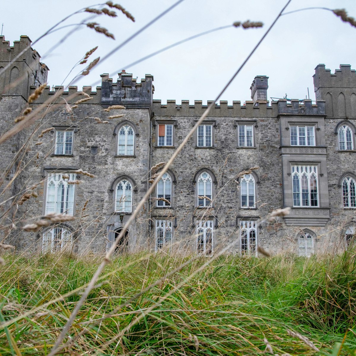 IRELAND-ENVIRONMENT-CLIMATE-NATURE
A picture shows Dunsany Castle, the seat of Randal Plunkett, Baron of Dunsany, in Dunsany, northwest of Dublin, Ireland, on October 13, 2021. - Randal Plunkett, the 21st Baron of Dunsany, strides out of his Irish castle in a t-shirt bearing the name of the US death metal band "Cannibal Corpse" in bloody lettering. In the distance, a russet-coloured stag appears for a moment, bracketed by impossibly green trees, before dissolving into the 750 acres (300 hectares) of ancestral estate Plunkett has surrendered to the wilderness. - TO GO WITH AFP STORY BY JOE STENSON (Photo by Paul Faith / AFP) / TO GO WITH AFP STORY BY JOE STENSON (Photo by PAUL FAITH/AFP via Getty Images)