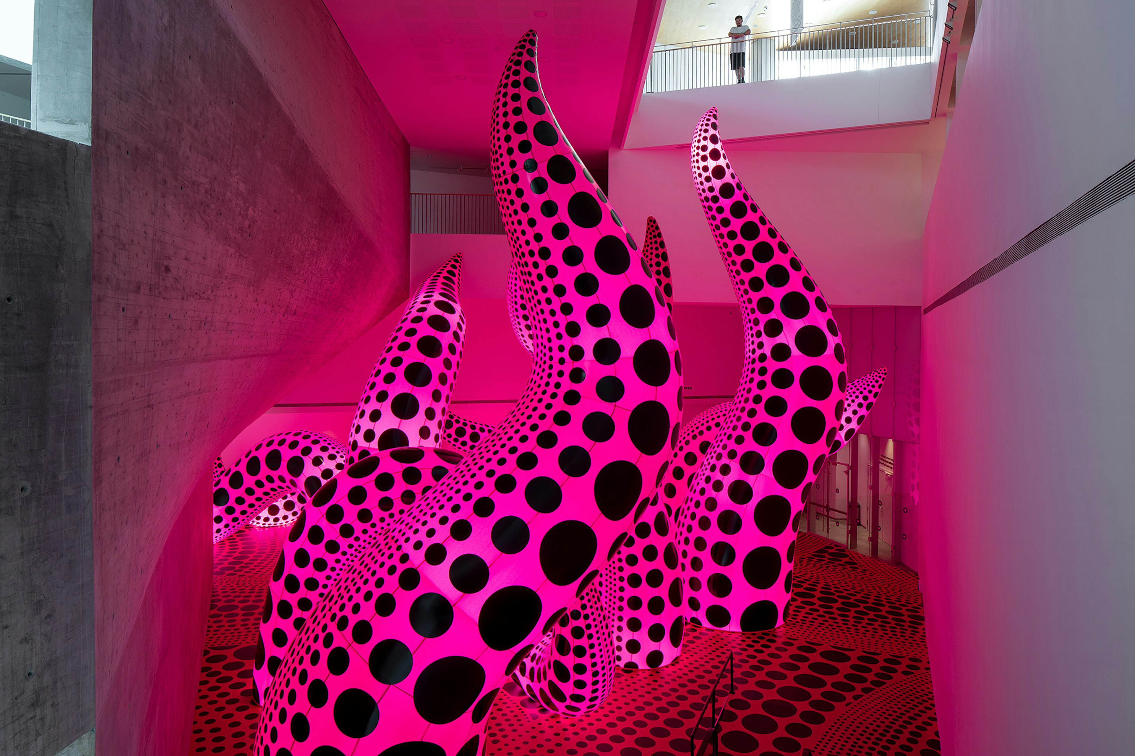 Bright pink tentacles with black polka dots at the Tel Aviv Museum of Art