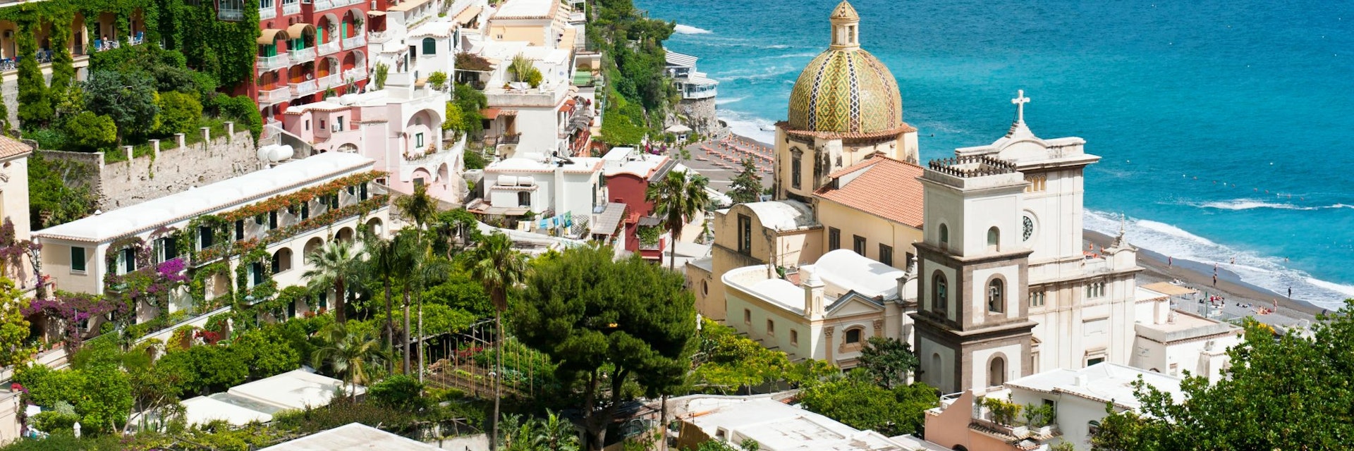 View of Positano with Chiesa di Santa Maria Assunta Church, Positano, Salerno, Amalfi Coast, Campania, Italy - stock photo
