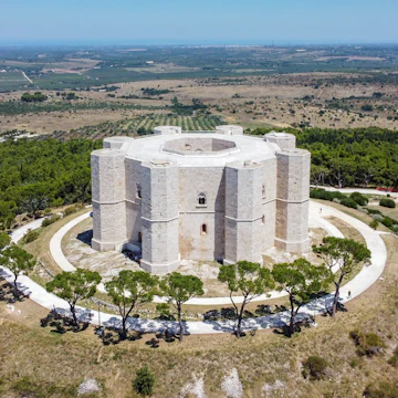 Aerial view of the Castel del Monte in Southern Italy - Octogonal shaped castle built by the Holy Roman Emperor Frederick II in the 13th century in Apulia; Shutterstock ID 1801891420; your: Bridget Brown; gl: 65050; netsuite: Online Editorial; full: POI Image Update