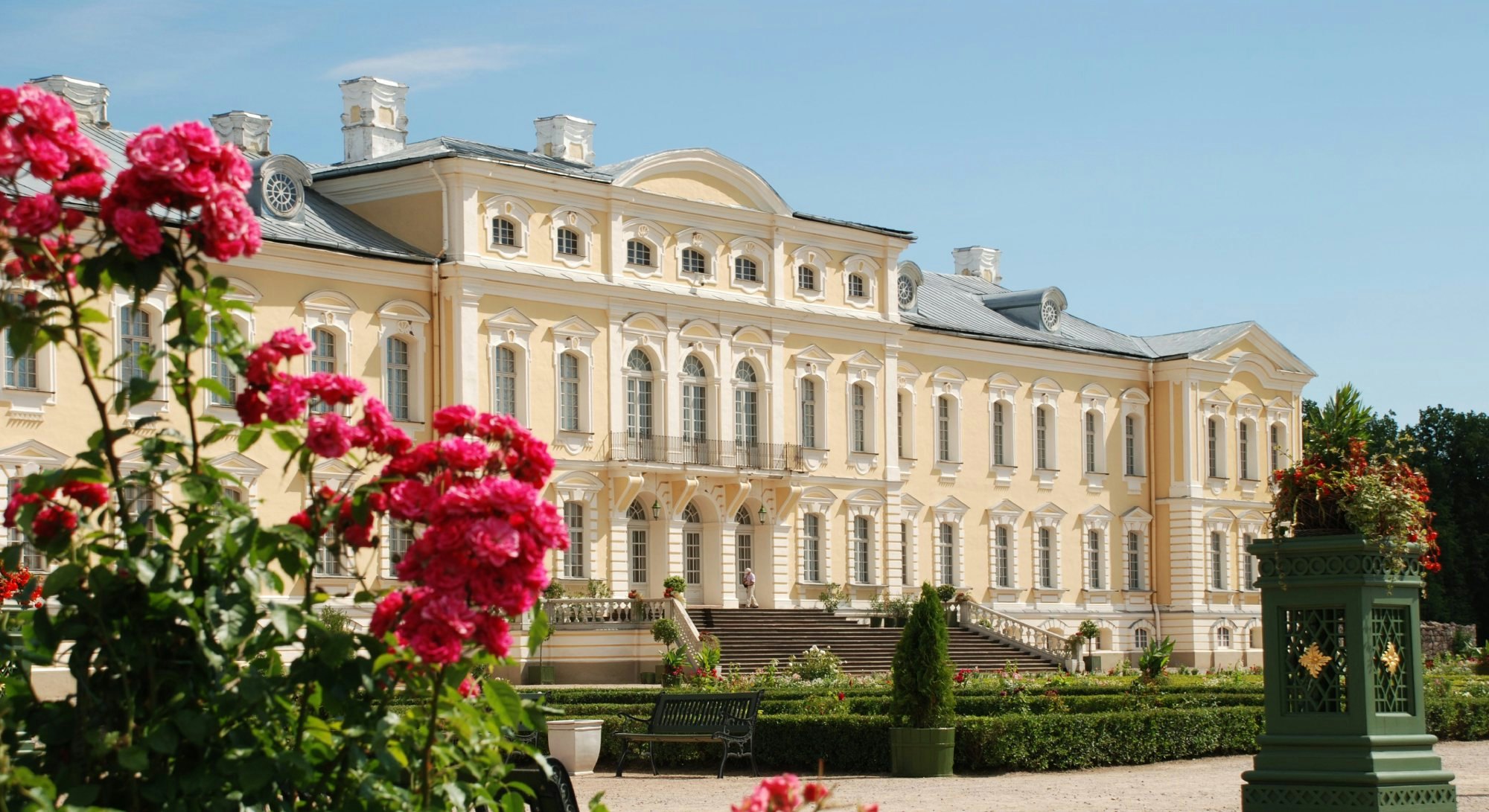 Rundale Palace is one of the most outstanding monuments of Baroque and Rococo art in Latvia. www.rundale.net
Beautiful roses and Baroque - Rococo style palace in background - stock photo