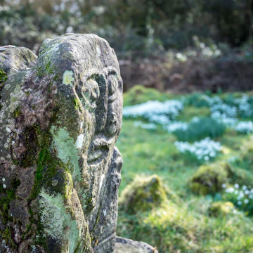 This is a bronze age stone carviing of a man on one side and a female on the other. They are located In Caldragh Cemetery on Boa Island, Lower Lough Erne. Northern Ireland