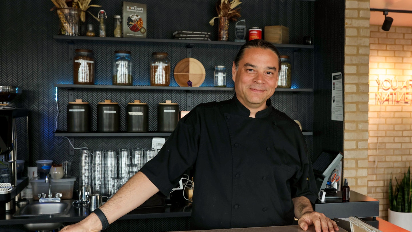 Chef and co-owner, Sean Sherman at front desk of Owamni.