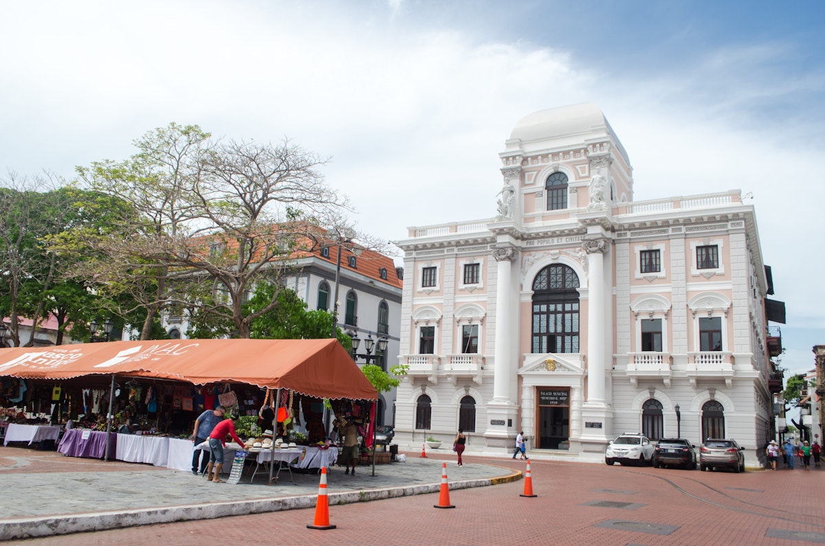 Panama City, Panama - May 19, 2019: Two historical buildings of the Old Panama City.  Panama Canal Museum can be seen on the left; on the right stands the Municipal Palace (white building). The Museum of History of Panama (Spanish: Museo de Historia de Panamá) is a history museum located on the ground floor of the Municipal Palace of Panama City.