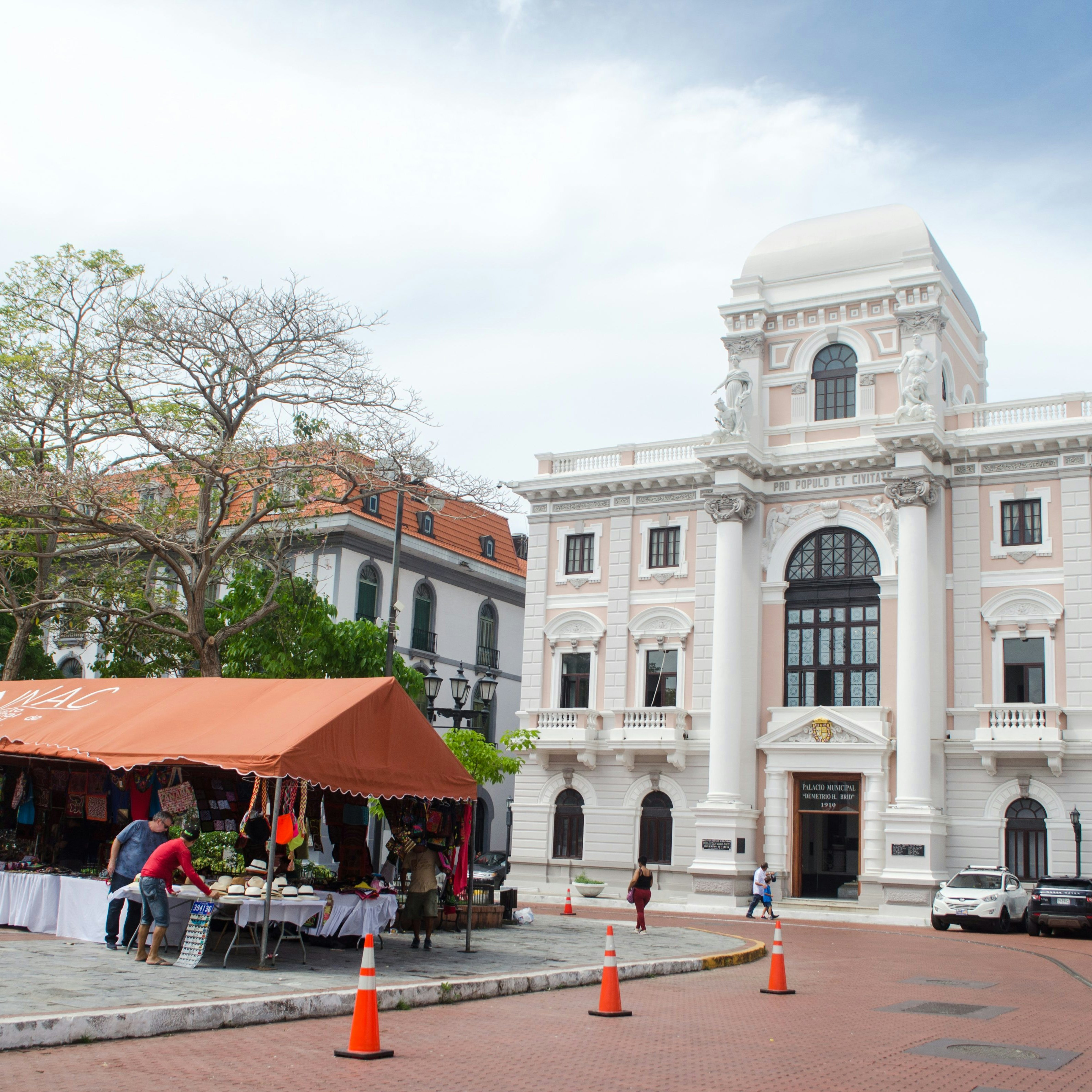 Panama City, Panama - May 19, 2019: Two historical buildings of the Old Panama City. Panama Canal Museum can be seen on the left; on the right stands the Municipal Palace (white building). The Museum of History of Panama (Spanish: Museo de Historia de Panamá) is a history museum located on the ground floor of the Municipal Palace of Panama City.