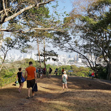 Panama City, Panama - 01/25/2019 People walking towards a view point in the Metropolitan Park in Panama City from which you can see the skyline of the city on a nice and sunny summer day.
Parque Natural Metropolitano