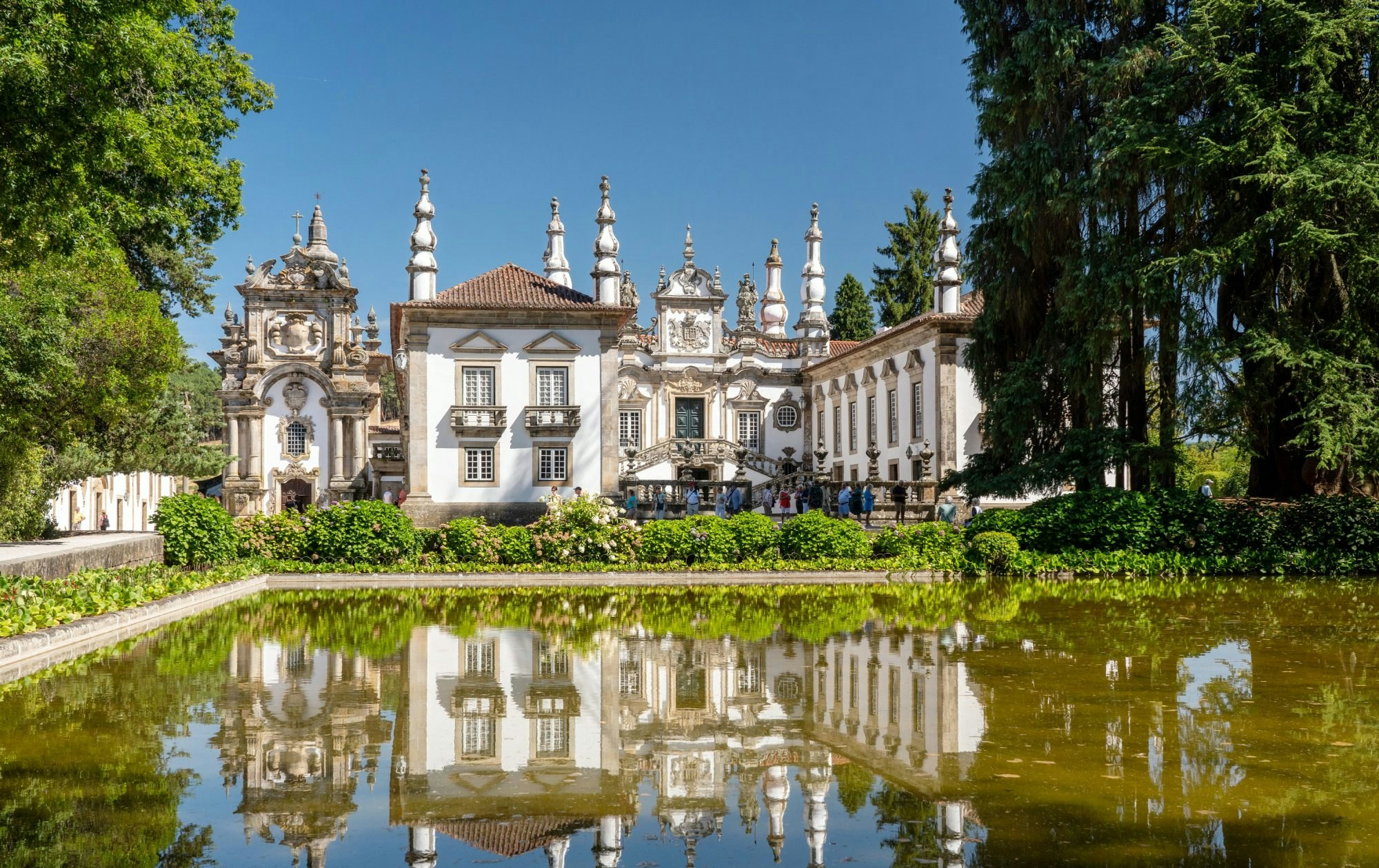 Vila Real, Portugal - 13 August 2019: Reflection of villa in front of entrance of Mateus Palace in Vila Real, Portugal; Shutterstock ID 1541661125; your: Bridget Brown; gl: 65050; netsuite: Online Editorial; full: POI Image Update