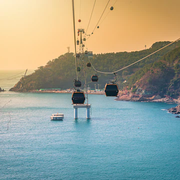 Songdo Marine Cable Car
Busan city with Haeundae beach at sunset in Busan, South Gyeongsang Province, South Korea.