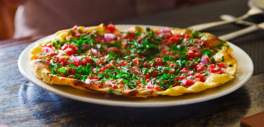 The delicious steak tartare pizza at Snake River Grill