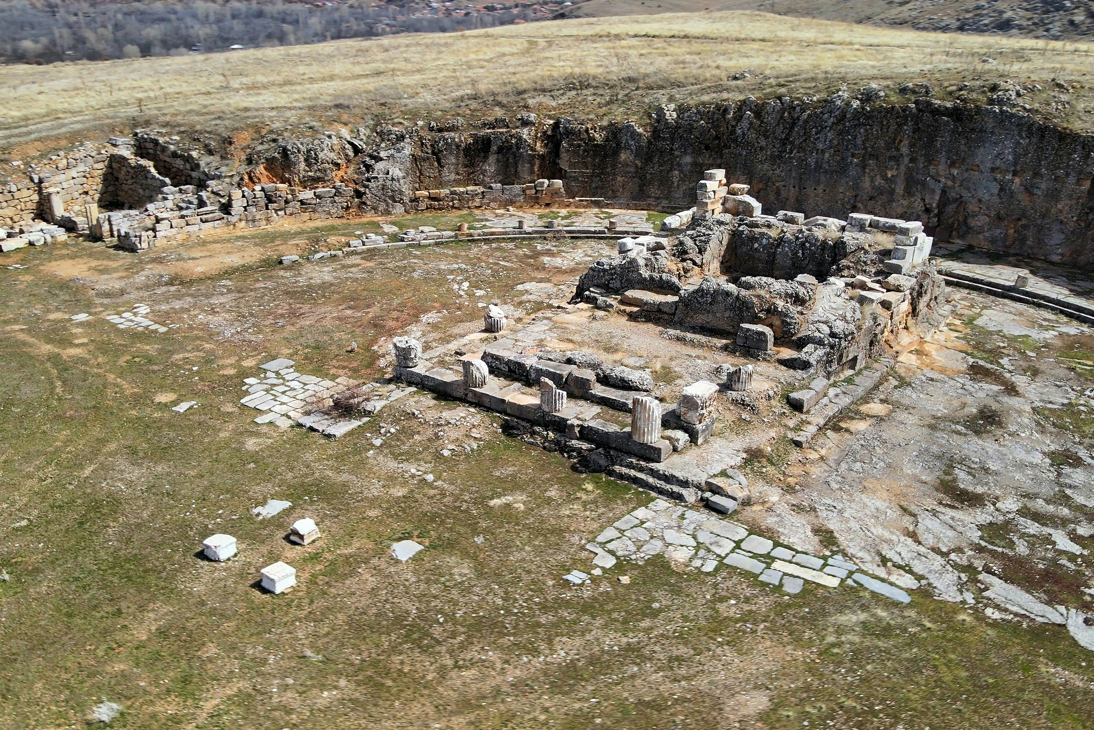 Antioch in Pisidia alternatively Antiochia in Pisidia or Pisidian Antioch and in Roman Empire, Latin: Antiochia Caesareia or Antiochia Colonia Caesarea – is a city in the Turkish Lakes Region, which is at the crossroads of the Mediterranean, Aegean and Central Anatolian regions, and formerly on the border of Pisidia and Phrygia, hence also known as Antiochia in Phrygia. The site lies approximately 1 km northeast of Yalvaç, the modern town of Isparta Province, Turkey. The city is on a hill with its highest point of 1236 m in the north.