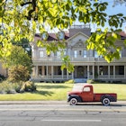 Classic 1950 Dodge pickup truck parked on College Street in the historic district of Macon, Georgia.  The district is listed on the National Register of Historic Places.