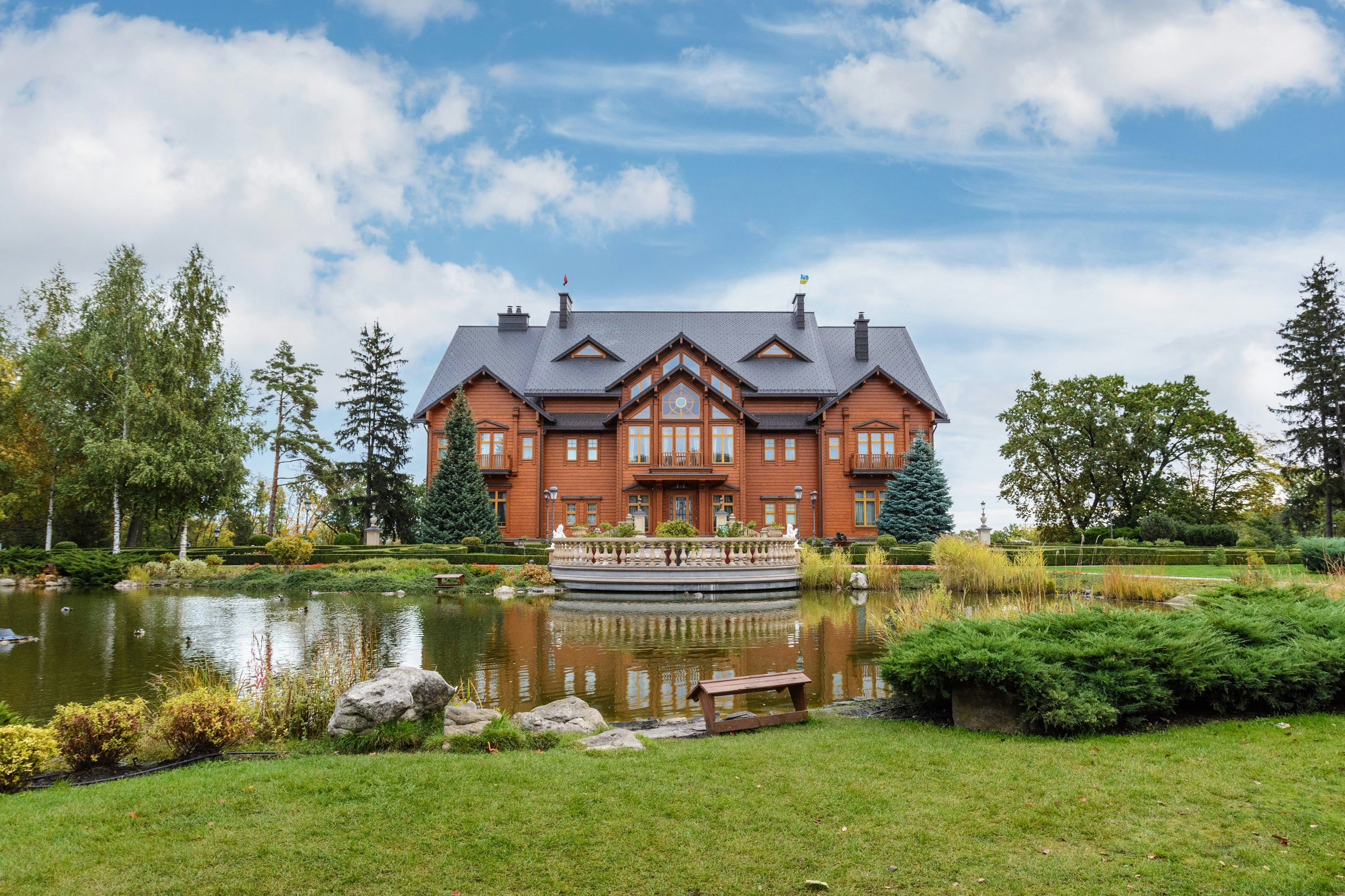 Mezhyhirya National Park, Novi Petrivtsi, Kyiv region, Ukraine - October, 16, 2020: Museum of Corruption. The large natural complex Mezhyhirya Residence with a beautiful garden, a cascade of lakes.