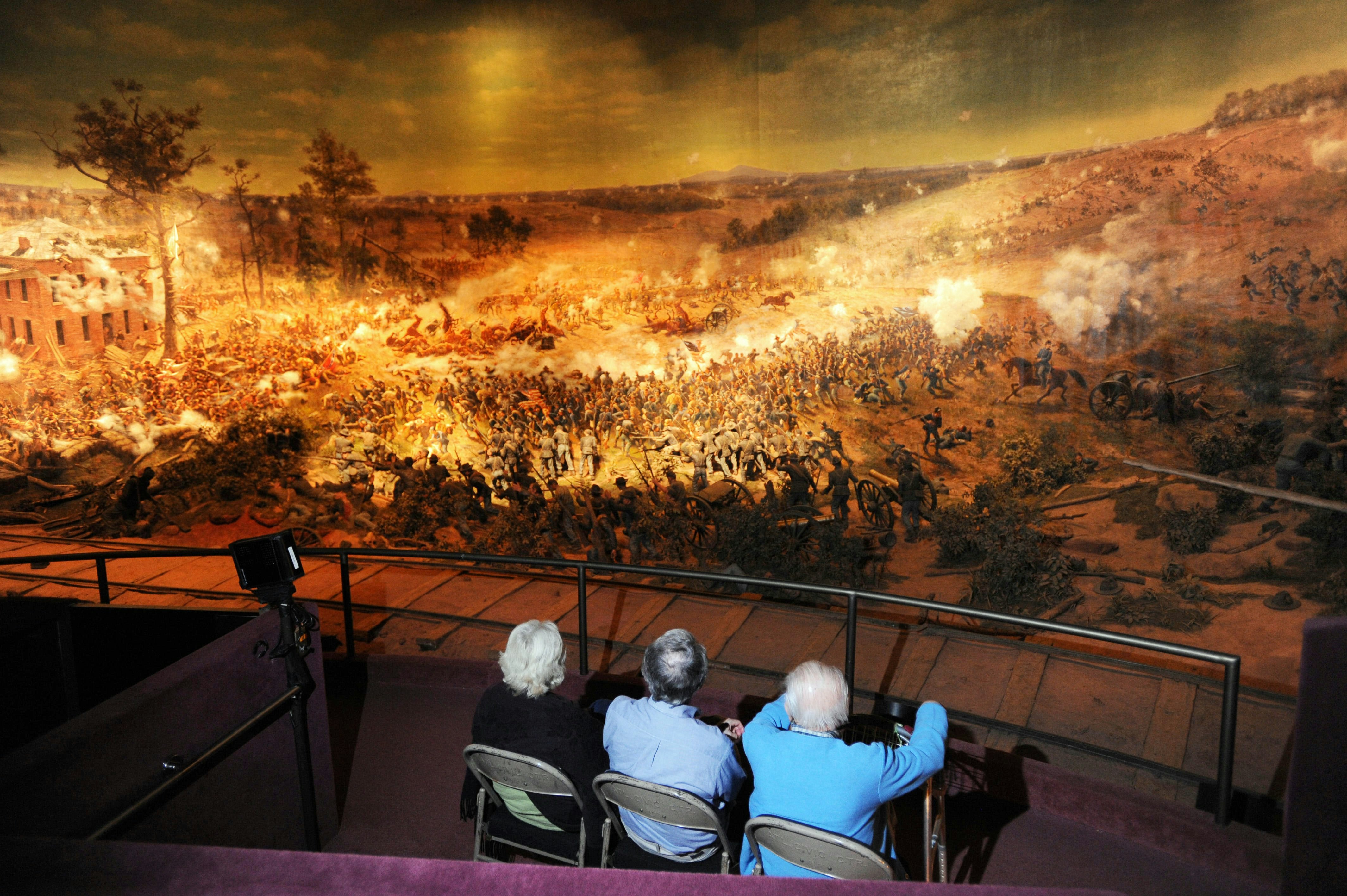CCM1FJ Nov. 13, 2010 - Atlanta, GA, U.S. - ATLANTA, GA - NOVEMBER 12: Visitors take in the panoramic painting and diorama depicting the Battle of Atlanta at the Cyclorama Civil War museum in Atlanta, Georgia on Friday, November 12, 2010. The sesquicentennial of the Civil War is in 2011. PHOTO CREDIT: ERIK