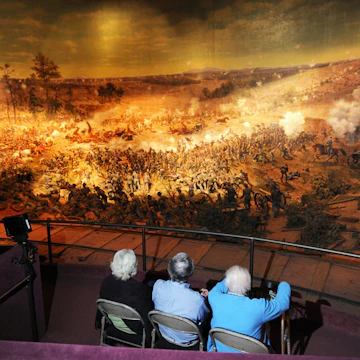 CCM1FJ Nov. 13, 2010 - Atlanta, GA, U.S. - ATLANTA, GA - NOVEMBER 12: Visitors take in the panoramic painting and diorama depicting the Battle of Atlanta at the Cyclorama Civil War museum in Atlanta, Georgia on Friday, November 12, 2010. The sesquicentennial of the Civil War is in 2011. PHOTO CREDIT: ERIK