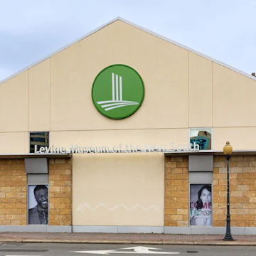 Charlotte, NC, USA-30 May 2021: College St. side view of the Levine Museum of the New South building.