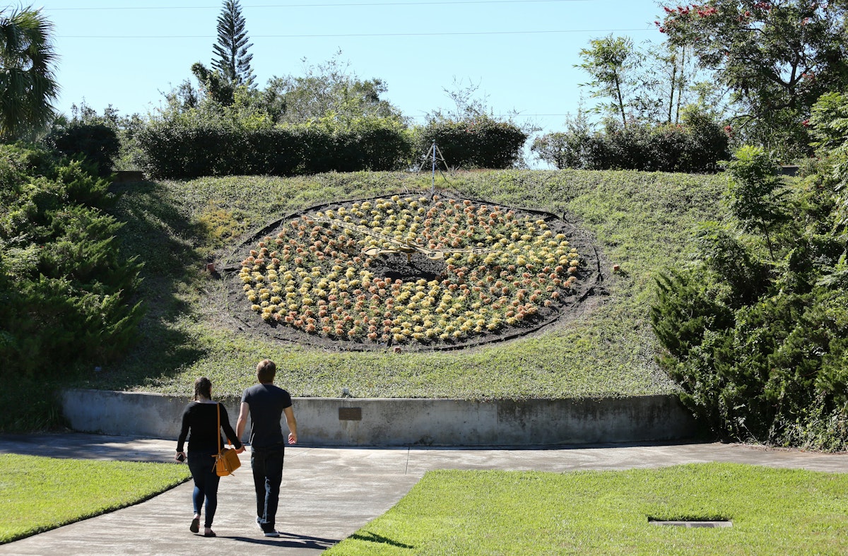 ORLANDO, FL, USA - OCTOBER 29: Visitors admire the larger than life living floral clock at Harry P. Leu Gardens, a destination garden with over 40 diverse plant collections as seen on October 29, 2017