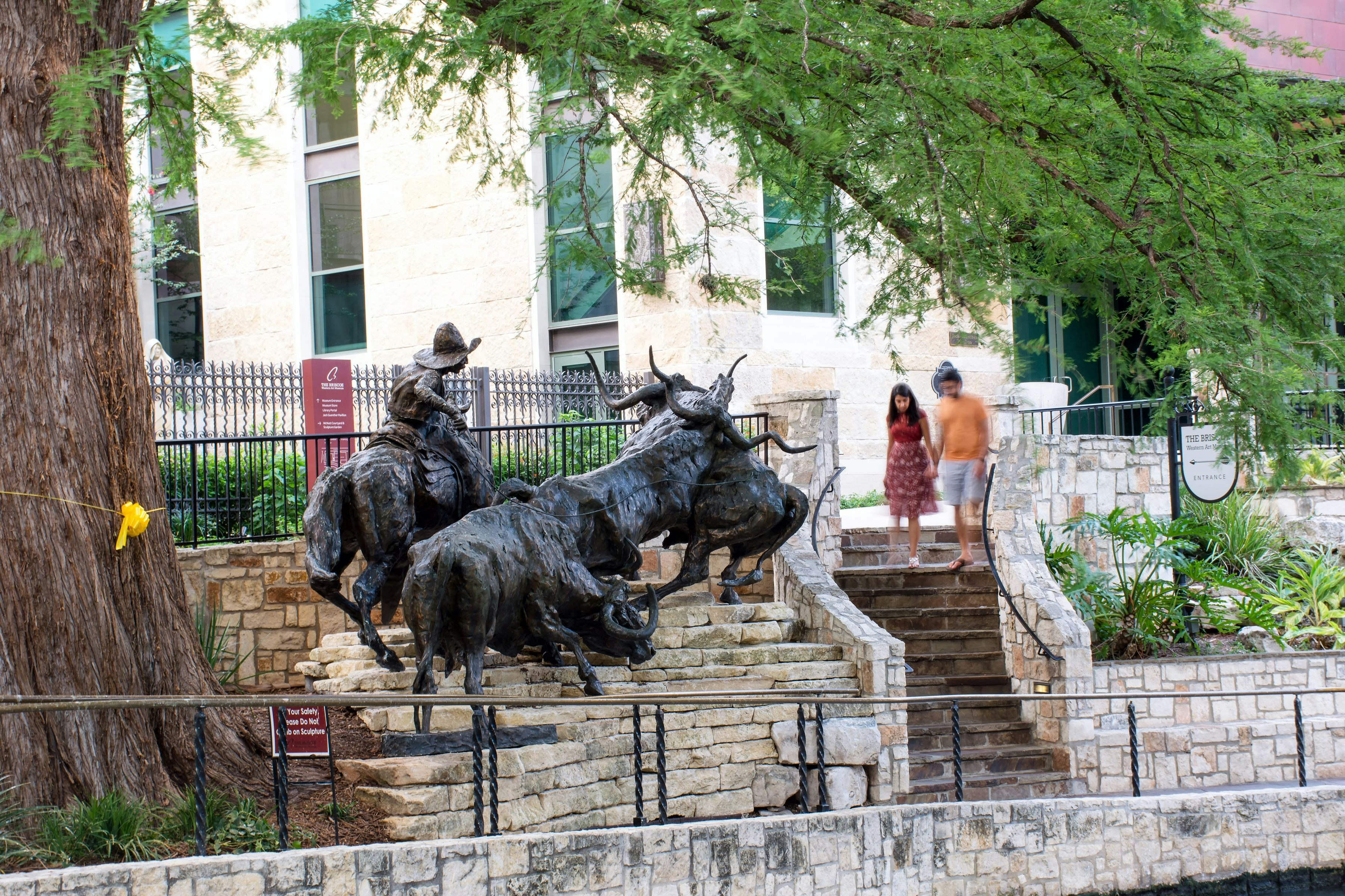 San Antonio, TX/USA- May 18 2019: "Coming Home to the Briscoe" is a statue by artist T.J.Kelsey outside the Briscoe Western Art Museum along the San Antonio River Walk, San Antonio, Texas.; Shutterstock ID 1444943180; your: Bridget Brown; gl: 65050; netsuite: Online Editorial; full: POI Image Update