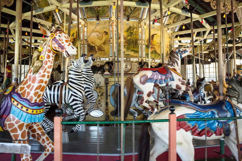 San Diego, California, USA – August 3, 2017: Horizontal view of the 1910 Balboa Park Carousel in motion ; Shutterstock ID 1365376670; your: Bridget Brown; gl: 65050; netsuite: Online Editorial; full: POI Image Update