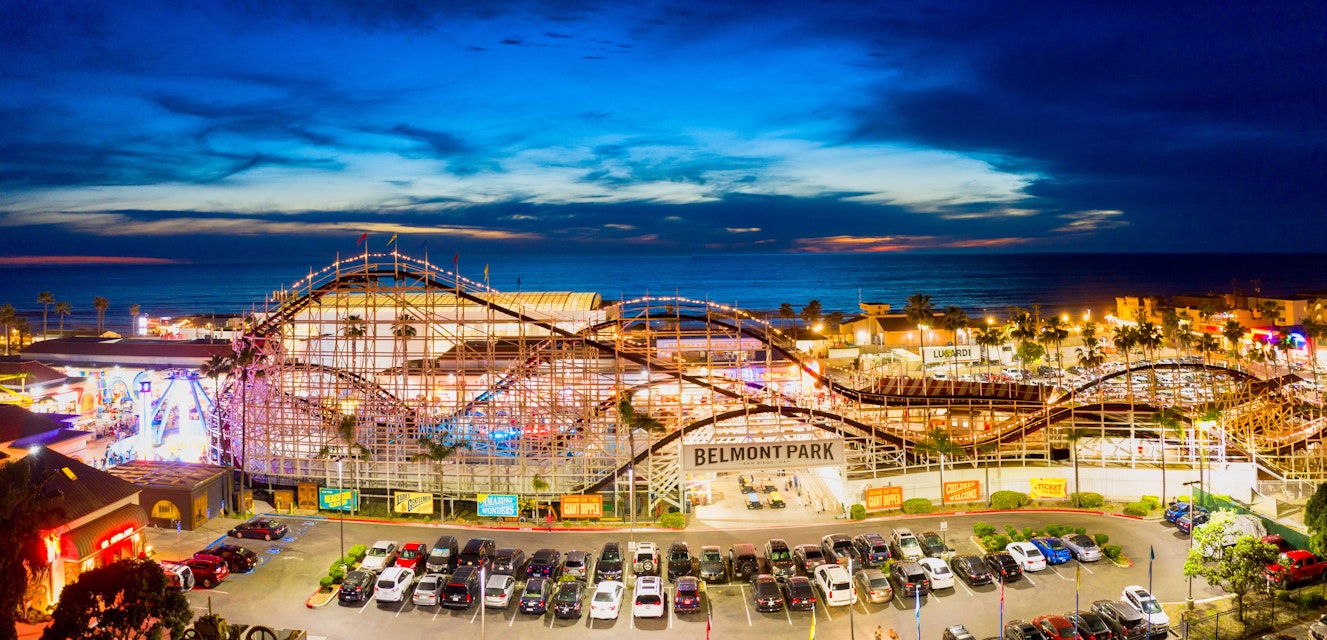 Editorial March 28, 2019 - Belmont Park roller coaster in Pacific Beach, San Diego California. Aerial drone photo taken late evening.; Shutterstock ID 1401262877; your: Bridget Brown; gl: 65050; netsuite: Online Editorial; full: POI Image Update